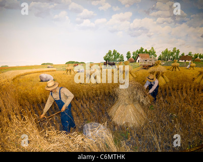 Diorama in Manitoba Museum der frühen Pionier Bauern Ernten in der kanadischen Prärie. Hier erntet eine ukrainische Familie Roggen. Stockfoto
