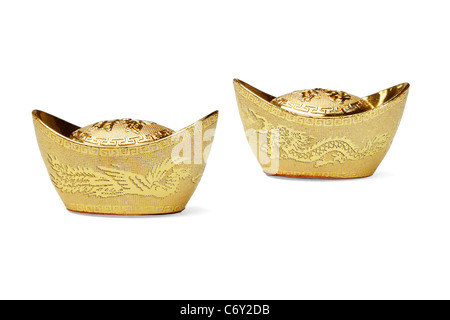 Chinesisches Neujahr-Drache und Phoenix gold Barren Ornamente auf weißem Hintergrund Stockfoto