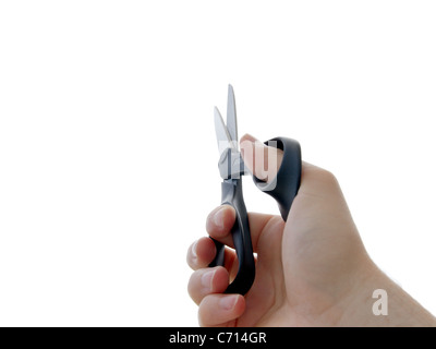 Schere in Menschenhand isoliert auf weiss Stockfoto