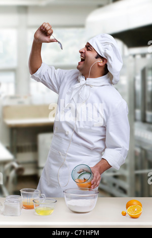 Koch, Spaß in der Küche Stockfoto