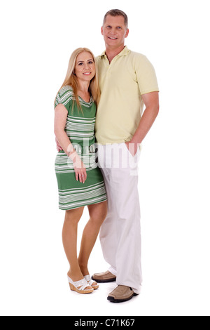 Voller Länge des Lächelns Mitte im Alter paar stehend über isolierte weißen Hintergrund Stockfoto