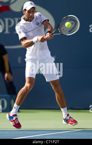 Novak Djokovic (SRB) im Wettbewerb bei den 2011 US Open Tennis. Stockfoto