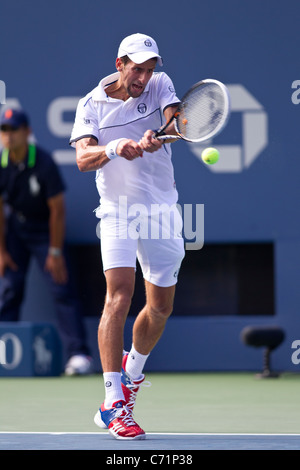 Novak Djokovic (SRB) im Wettbewerb bei den 2011 US Open Tennis. Stockfoto