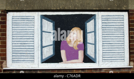 Gemälde einer Frau an der Seite einer Wand Stockfoto