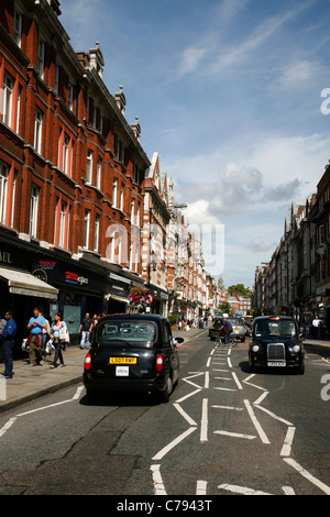 Taxis auf Marylebone High Street, Marylebone, London, UK Stockfoto