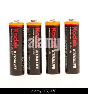 Vier Kodak AA-Batterien auf eine weiße Hintergrundbeleuchtung-Hintergrund Stockfoto