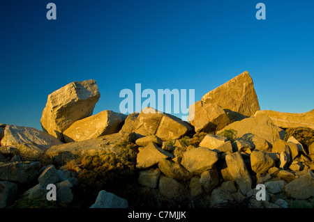 Erste Licht des Tages scheint auf diesem Haufen Sand Stein Stockfoto