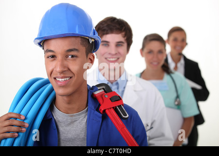 Vier Arbeiter mit verschiedenen Berufen Stockfoto