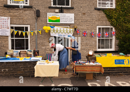 Eine Marie Curie Cancer Care stall am Wochenende 1940 an Leyburn in North Yorkshire, England, Großbritannien, Uk Stockfoto