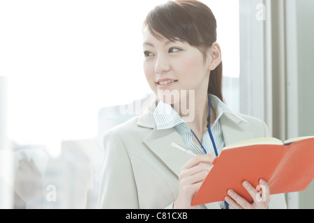 Geschäftsfrau mit Notebook Stockfoto