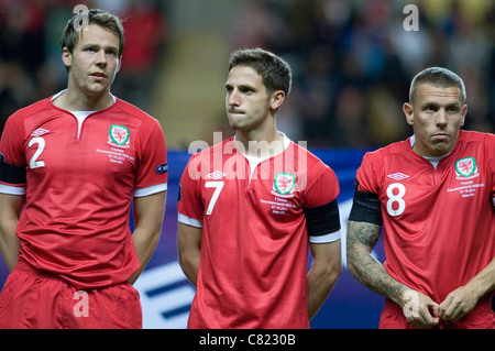 Wales V Schweiz - Euro 2012 Qualifying Match @ Liberty Stadium in Swansea.Wales Spieler von links nach rechts: Chris Gunter, Joe Allen und Craig Bellamy. Stockfoto