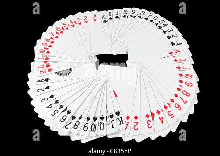 Spielkarten aufgefächert in einem Rad zeigt alle Anzüge Stockfoto