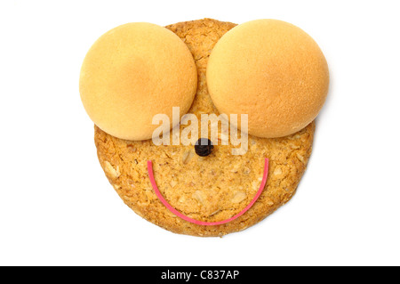 Cookie-Lächeln isoliert auf weiss Stockfoto