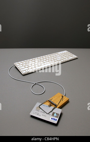 Caredit Karte in Mausefalle an Tastatur angeschlossen Stockfoto