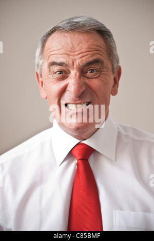 Porträt des Mannes Grimassen Stockfoto