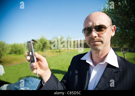 Mann Fotografieren bei Hochzeit Stockfoto