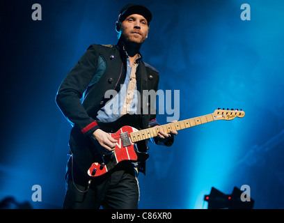 BELFAST, Vereinigtes Königreich - 19 Dezember: Jonny Buckland von Coldplay führt auf Odyssey Arena am 19. Dezember 2008 in Belfast, Nordirland Stockfoto