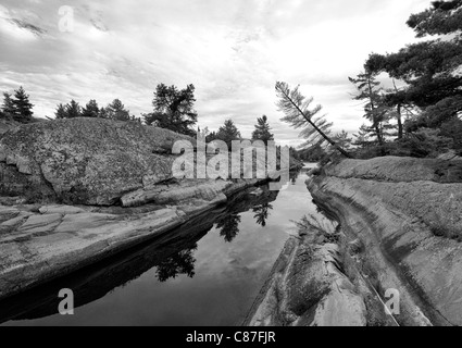 Die schlechte Flussgebiet von Georgian Bay ist berühmt für es gute Angelmöglichkeiten und spektakuläre Landschaften.  Es ist nur mit Boot erreichbar Stockfoto