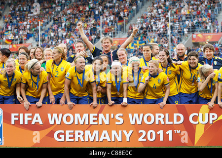 Schweden-Spieler feiern nach dem Sieg über Frankreich in die 2011 FIFA Frauen WM Dritter match bei Rhein-Neckar-Arena. Stockfoto