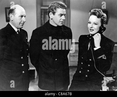 COMMANDOS STRIKE im Morgengrauen 1942 Columbia Film mit von links: Cedric Hardwicke, Paul Muni und Anna Lee Stockfoto