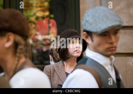 Radfahrer-Kleid in traditionellen britischen Radsport Outfits zur Teilnahme an der Tweed Run in New York Stockfoto