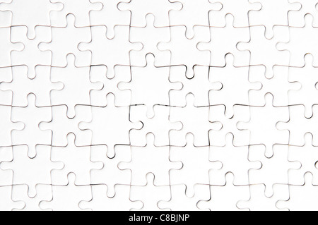 leere weiße Jigsaw Puzzle abgeschlossen Stockfoto