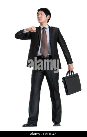 Entschlossenen Geschäftsmann stehend Stockfoto