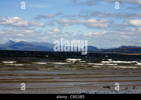 Loch Carron und die Applecross Berge aus Rubha Ardnish Strand Breakish Broadford Isle Of Skye Schottland Stockfoto