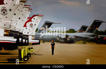 Staff Sgt. Walter Jenkins marshals in Thunderbird Four after arriving on the Charleston Air Force Base, S.C., flightline April 28. The Air Force Thunderbirds will perform at the 2008 "Wings Over Charleston" air expo May 3. Sergeant Jenkins is a crew chief for the Thunderbirds. Stockfoto