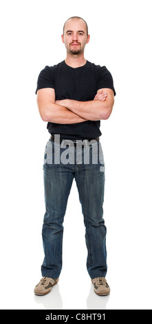 junge stehenden Mannes verschränkte Arme Stockfoto