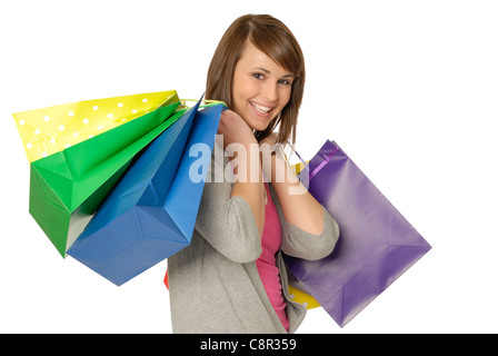 Schöne, frische konfrontiert, junge, lächelnde Frau mit vielen bunten Einkaufstüten Stockfoto