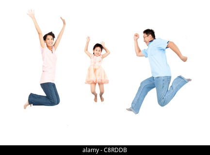 glückliche Familie springen und isoliert auf weißem Hintergrund Stockfoto