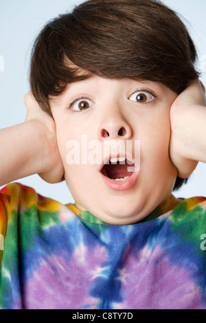 Studio-Porträt eines jungen mit Kopf in Händen Stockfoto