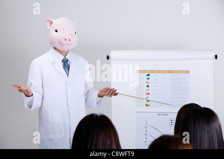 Schwein Kopf Ernährungsberaterin Ernährung Diagramm für die Patienten zeigen Stockfoto