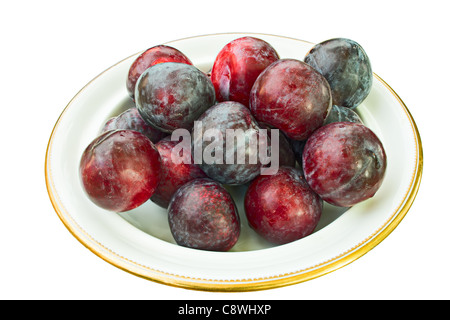 Schüssel voller ganze, reife Pflaumen, bedeckt mit natürlichem Wachs Blüte Stockfoto