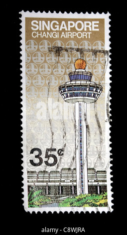 Eine Briefmarke von Singapore Changi Airport in schwarzem Hintergrund Stockfoto