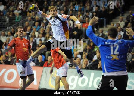 03 11 2011 Handball Supercup Berlin, Deutschland, Deutschland gegen Dänemark.  Michael Haass Nr. 24 Mads Christiansen Dänemark keine 03 Rasmussen Dänemark TW Nr. 12 Handball Nationalmannschaft internationale match DHB-Supercup Stockfoto