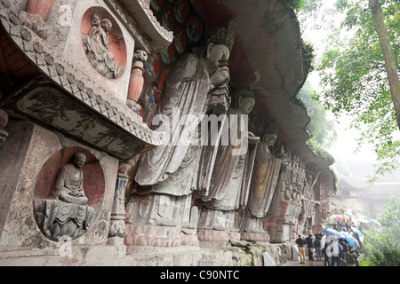 Buddhistischen Grotten von Dazu Dazu Rock Carvings World Heritage Site ein buddhistischer Mönch fing an Schnitzereien in den Felsen in der 11. Cen zu tun Stockfoto