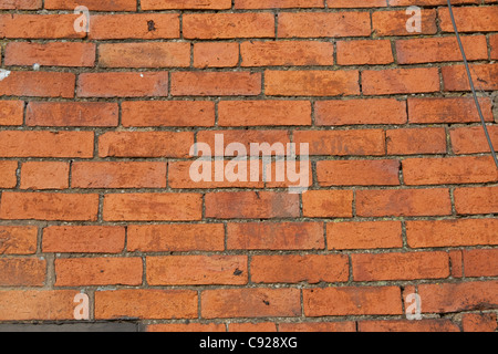 handgemachte rote Ziegelsteine in Wand altes Bauernhaus Colemans Hill Farm Mickleton UK Stockfoto
