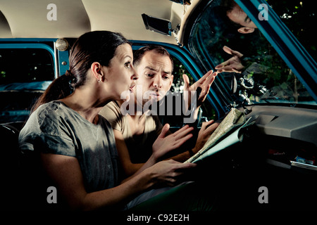 Streiten, paar fahren während verloren Stockfoto