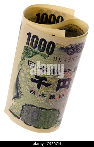 Gerollte japanische Dollarnoten isoliert auf weißem Hintergrund Stockfoto