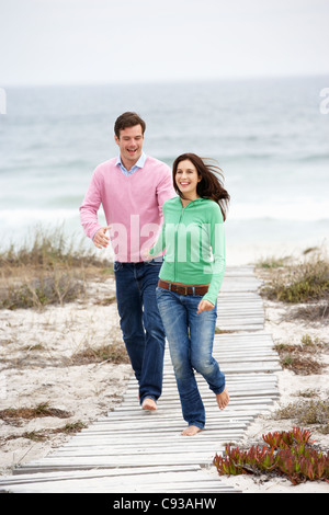 Paar Strand Weg laufen Stockfoto