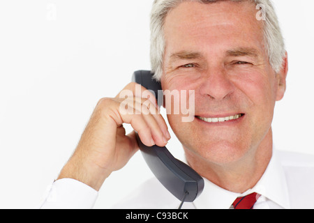 Leitenden Geschäftsmann auf Handy Stockfoto