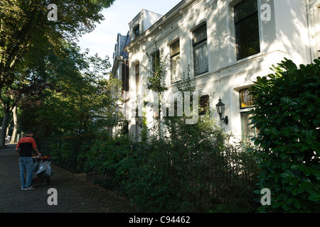 Postbote in Rotterdam Stockfoto