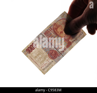 Hand, die alten italienischen 1000 Lire banknote Stockfoto