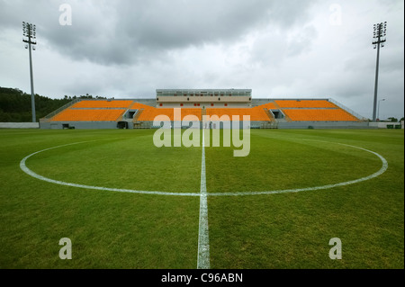 Football pitch and empty stadium stand Stockfoto