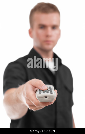 Männliches Model Holding Fernbedienung. Menschen und Dinge in unterschiedlichen Lebenssituationen. Stockfoto