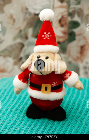 Der Weihnachtsmann (Santa Claus) Kuscheltier Hund Stockfoto