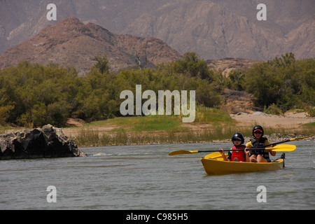 Kajakfahrer auf dem Orange river Stockfoto
