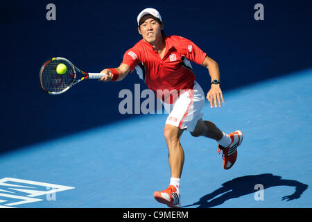 25.01.2012 Australian Open Tennis aus Melbourne Park. Kei Nishikori (JPN) kehrt ein Schuss am zehnten Tag des Australian Open Tennis Championships in Melbourne, Australien. Stockfoto